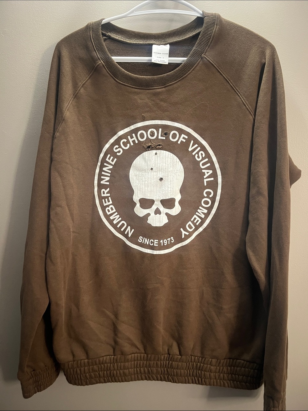 Number (N)INE Graphic Crewneck Sweatshirt with White Skull Emblem